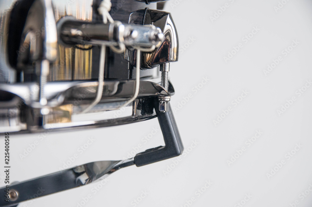 Musical instruments close up. Beautiful snare drum parts Musical instruments close up. Beautiful snare drum parts