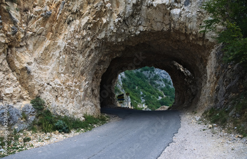 A junction in the middle of a mountain. Roads leading to Žabljak, Boričje and Trsa. The tunnel-junction is located near the Piva lake on the way to Durmitor national park, Montenegro.