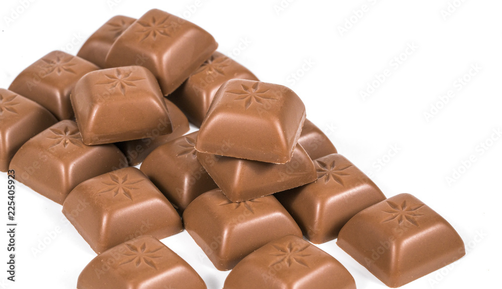 Fototapeta premium Chocolate bars stack isolated on white background