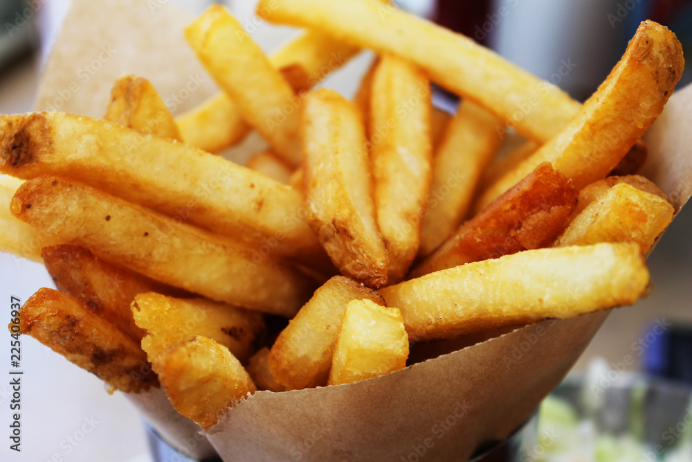 French fries served in a paper cone French fries served in a paper cone