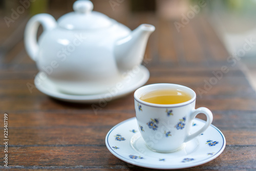 Hot tea in a white pitcher