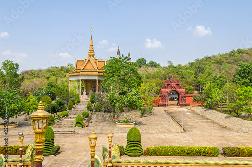 One of the shrines and a four-faced gopura in the Vipassana Dhura Buddhist Meditation Center in Cambodia