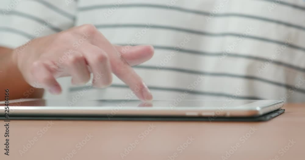 Woman use of tablet computer Woman use of tablet computer