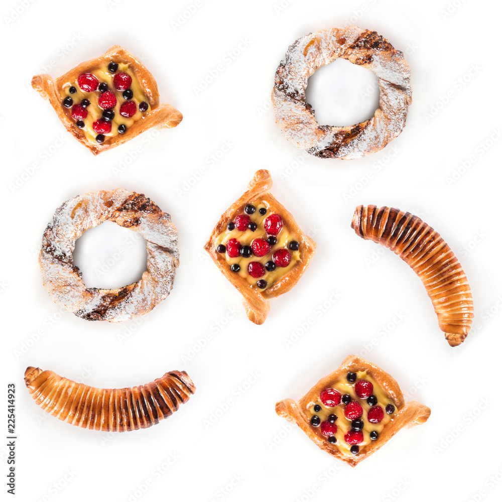Set of assorted sweet pastries isolated on white background. Concept of pastry, top view