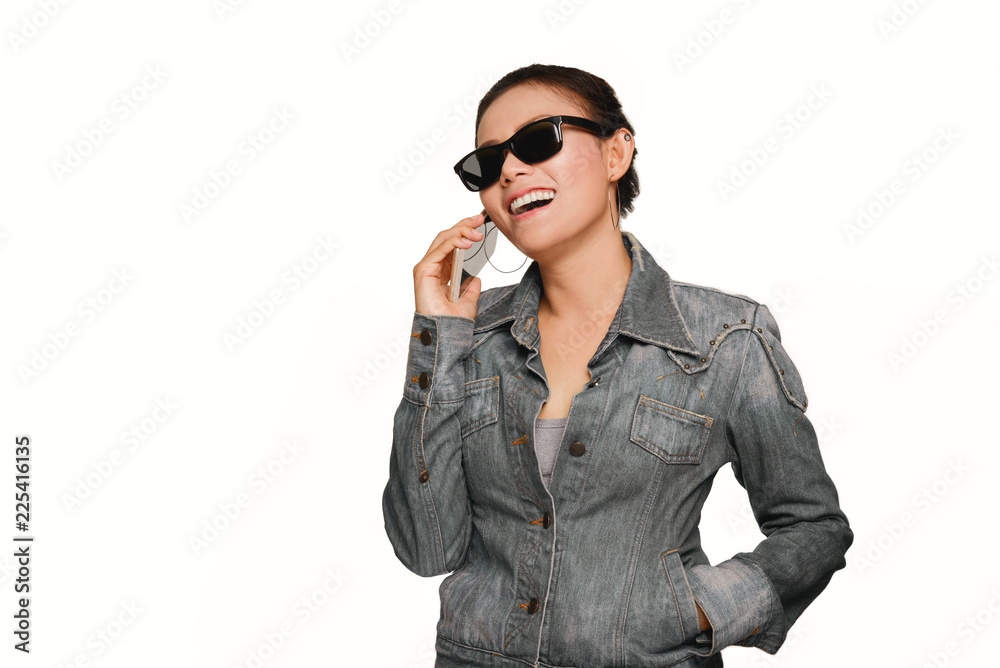 The fun of Asian girls now talk her phone.White background The fun of Asian girls now talk her phone.White background