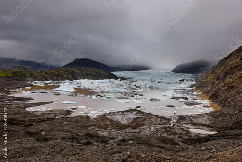 Frozen landscape at a drainglacier of the large glacier vatnajokull glacier, Iceland. Glacier provides water Ice Lagoon Jokulsarlon. photo