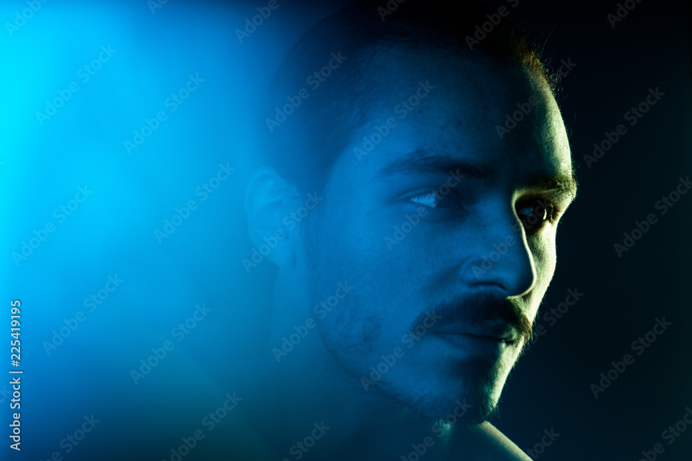 Cinematic portrait of man with lights and prism Cinematic portrait of man with lights and prism