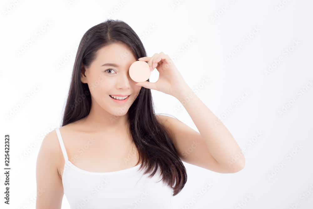 Portrait of beautiful asian woman applying powder puff at cheek makeup of cosmetic, beauty of girl with face smile isolated on white background, wellness and healthcare concept. Portrait of beautiful asian woman applying powder puff at cheek makeup of cosmetic, beauty of girl with face smile isolated on white background, wellness and healthcare concept.