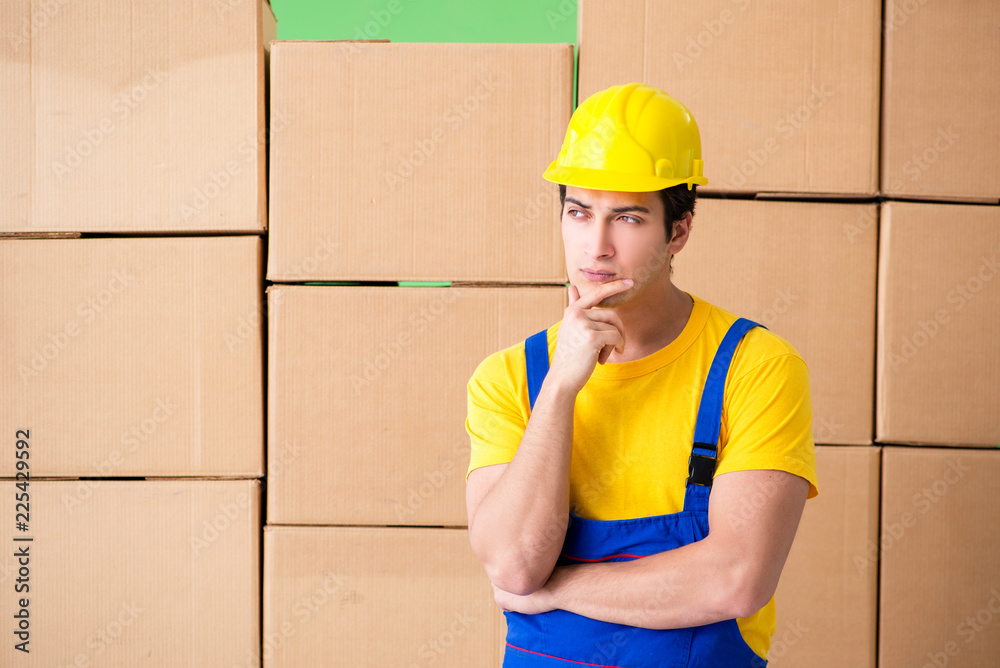 Man contractor working with boxes delivery Man contractor working with boxes delivery