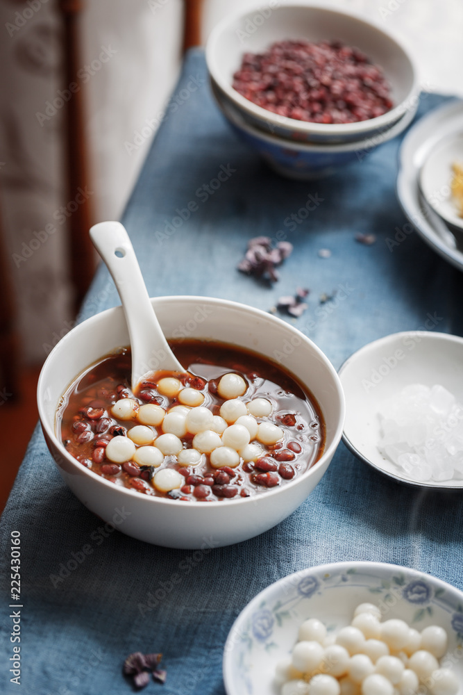 a bowl of sweet red bean soup with mini tang yuan a bowl of sweet red bean soup with mini tang yuan