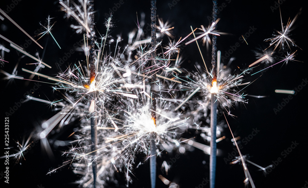 Fototapeta premium Fireworks , sparklers ,bursting against a black background