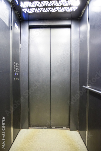 interior of a modern silvery elevator