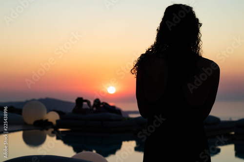 Foto People watching sunset, Santorini, Greece