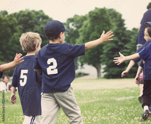 Canvas Print High Five line after a childs tee ball game