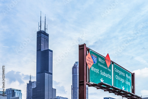 Chicago highway sign with downtown skyline in the background