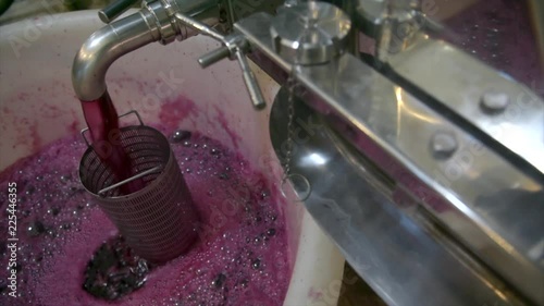 Wine mixing during fermentation process photo