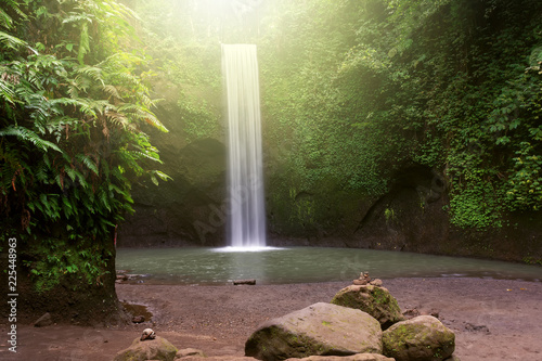 Long exposure Tibumana waterfall in Bangli, Bali Indonesia photo