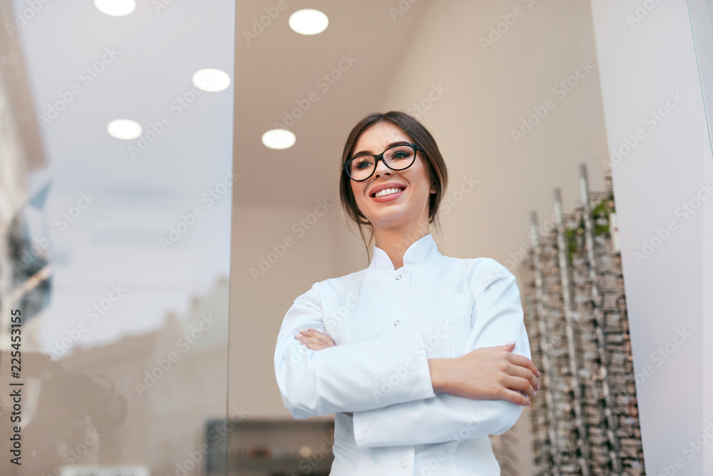 Optician Woman At Eyeglasses Store Portrait Optician Woman At Eyeglasses Store Portrait