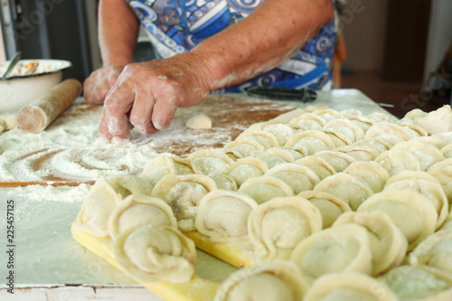 Home-made recipe for dumplings (raviol)i. Traditionally, women of the older generation mold the dumplings in the family.