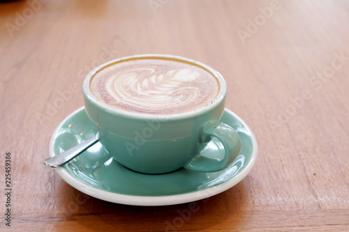 Latte Coffee art on the wooden desk
