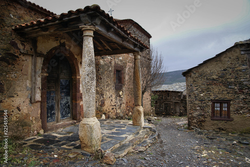 Urban autumn landscape in one of black cities of Spain  El Muyo photo