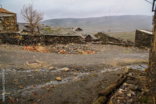 Urban autumn landscape in one of black cities of Spain  El Muyo photo