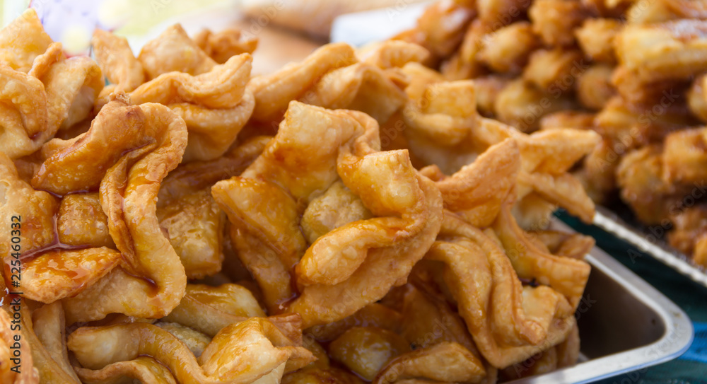 fried pastries stuffed with sweet potato or quince typical of the Argentine gastronomy fried pastries stuffed with sweet potato or quince typical of the Argentine gastronomy