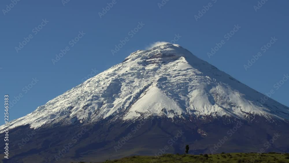 Clouds streaming over the glaciers on the summit of Cotopaxi Volcano in the Ecuadorian Andes. One of the world's highest active volcanoes at 5,897m. Clouds streaming over the glaciers on the summit of Cotopaxi Volcano in the Ecuadorian Andes. One of the world's highest active volcanoes at 5,897m.