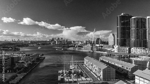 SYDNEY  AUSTRALIA - AUGUST 19  2018  City skyline aerial view from Darling Harbour. Sydney attracts 15 million tourists annually