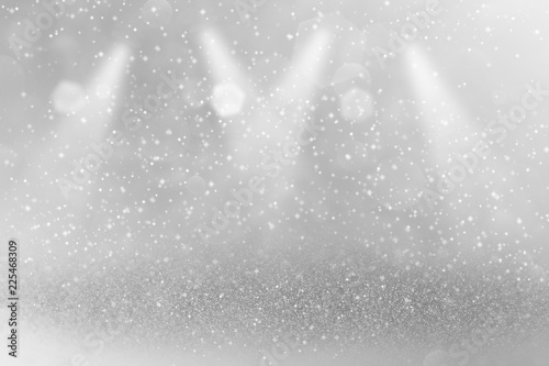 fantastic shiny glitter lights defocused stage spotlights bokeh abstract background with sparks fly, holiday mockup texture with blank space for your content