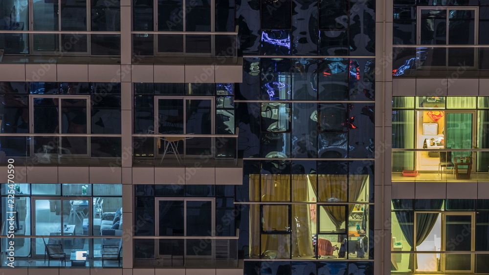 Scenic glowing windows of skyscrapers at evening timelapse Scenic glowing windows of skyscrapers at evening timelapse