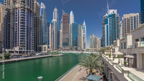 Panoramic view with modern skyscrapers and yachts of Dubai Marina timelapse hyperlapse, United Arab Emirates © neiezhmakov