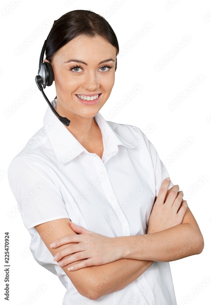Friendly Woman Talking on Headset with Arms Crossed - Isolated Friendly Woman Talking on Headset with Arms Crossed - Isolated