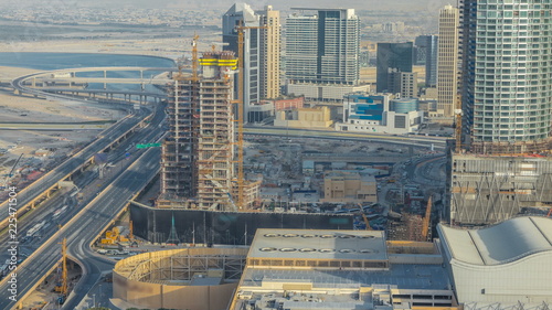 Dubai downtown during sunset timelapse. Top view from above