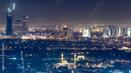 Aerial view to Deira district with airport timelapse photo