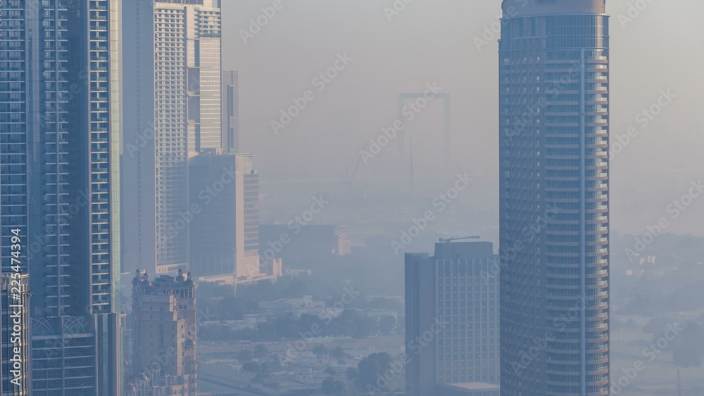 Foggy morning in downtown of Dubai timelapse.