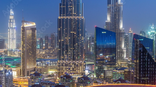 Dubai downtown skyline day to night timelapse with tallest building and Sheikh Zayed road traffic, UAE © neiezhmakov