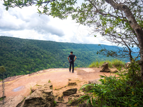 Young Asian Tourist Looking Away at View in Khao Yai National park Thailand