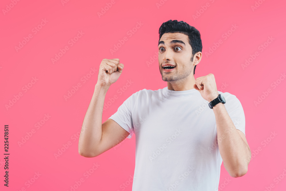 shocked handsome man showing yes gesture isolated on pink shocked handsome man showing yes gesture isolated on pink