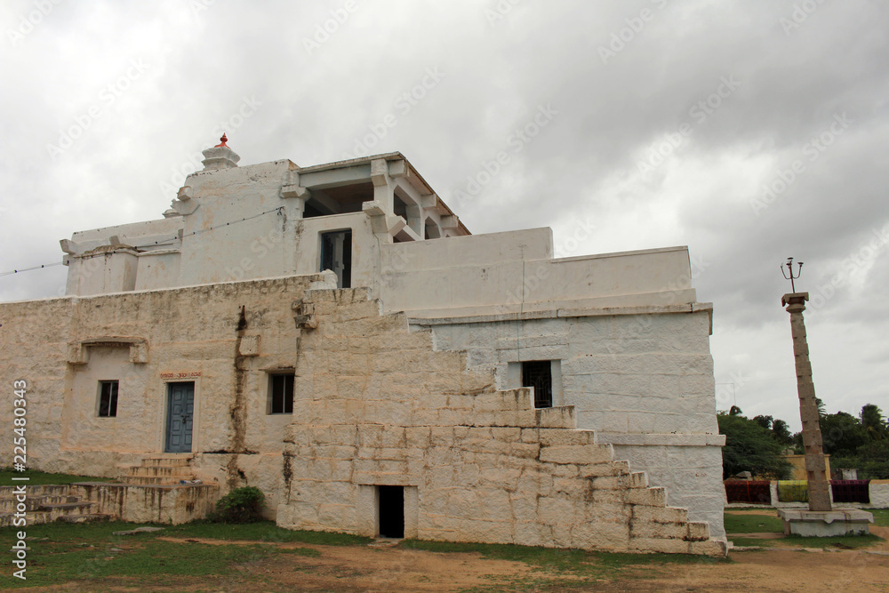 A white ashram across the main island of Hampi (Anegundi)
