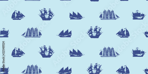 Vector seamless background on the theme of sea travel with various sailing ships. Dark blue sea objects on a light blue background in retro style