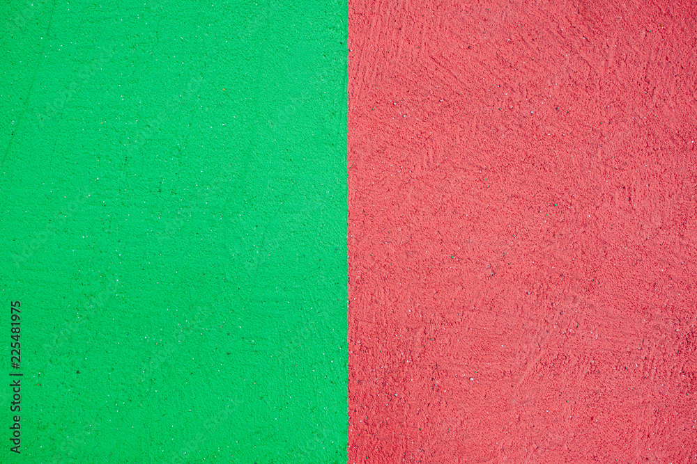 Red and green colored asphalt on street, texture background