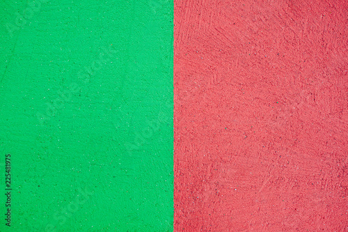 Red and green colored asphalt on street, texture background photo