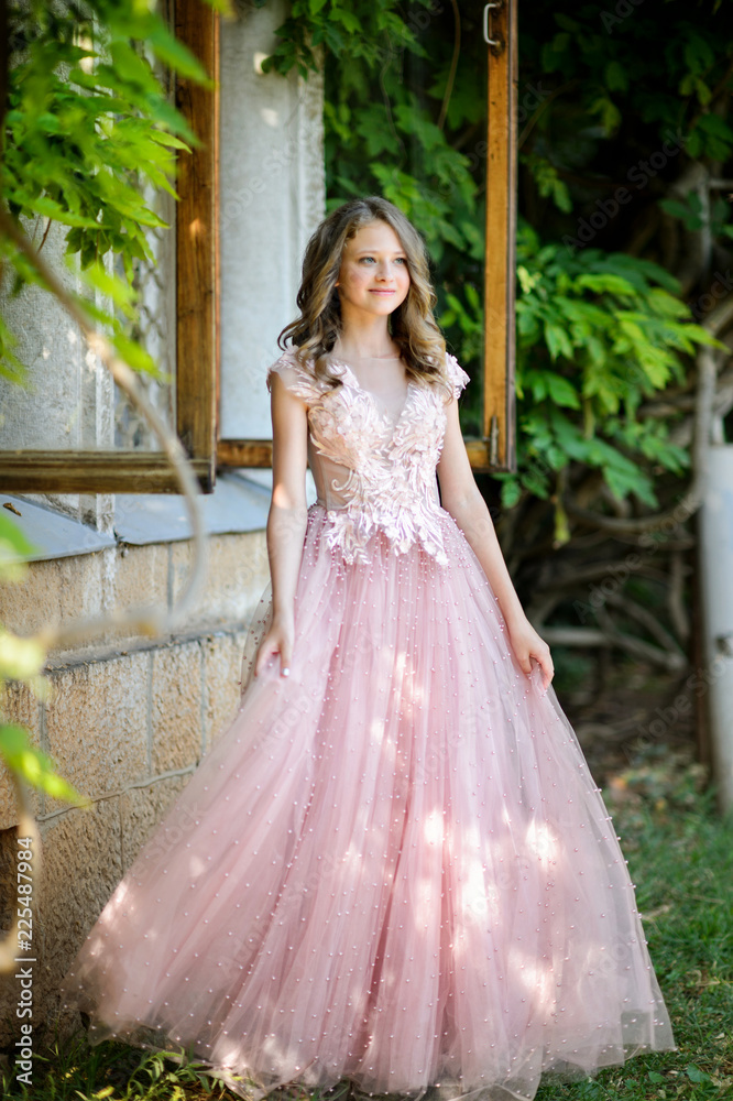 Beautiful girl in amazing dress outdoor. Wedding dress Beautiful girl in amazing dress outdoor. Wedding dress