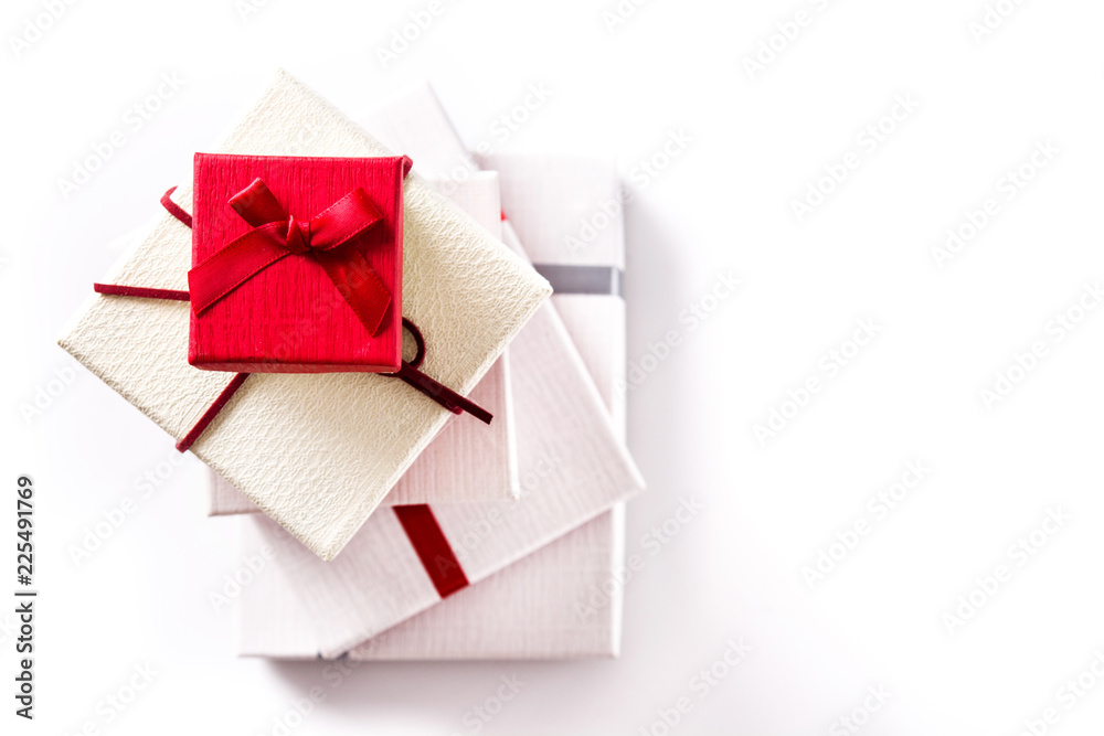 White and red gift boxes isolated on white background. Top view. Copyspace White and red gift boxes isolated on white background. Top view. Copyspace