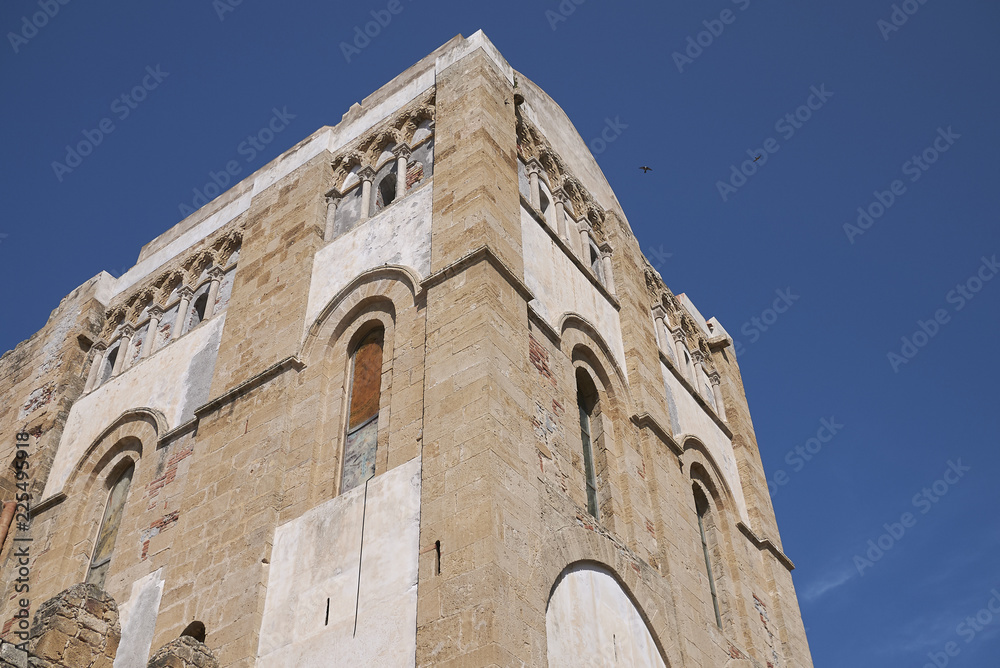 Cefalu, Italy - September 09, 2018: Side view of the Cathedral of Cefalu