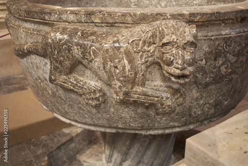 Cefalu, Italy - September 09, 2018: Baptisimal font of the Cathedral of Cefalu