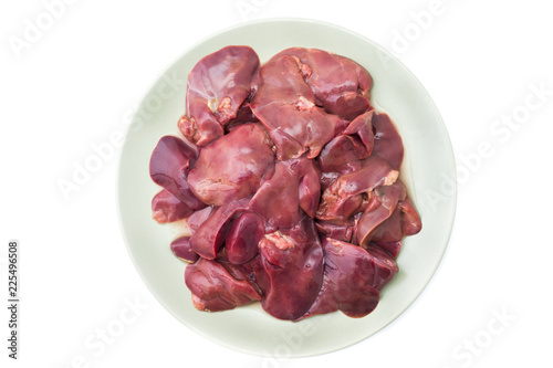Fresh raw chicken liver on a plate. Isolated on white