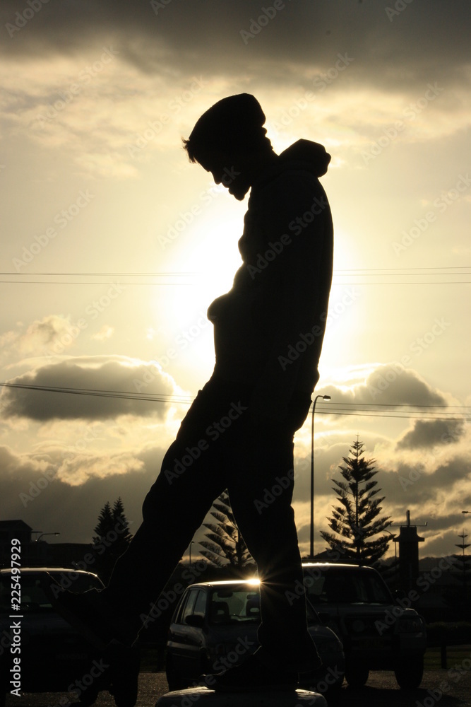 silhouette of man on background of white sky silhouette of man on background of white sky
