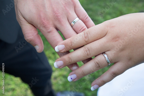 Newly wedding couple hands with wedding rings